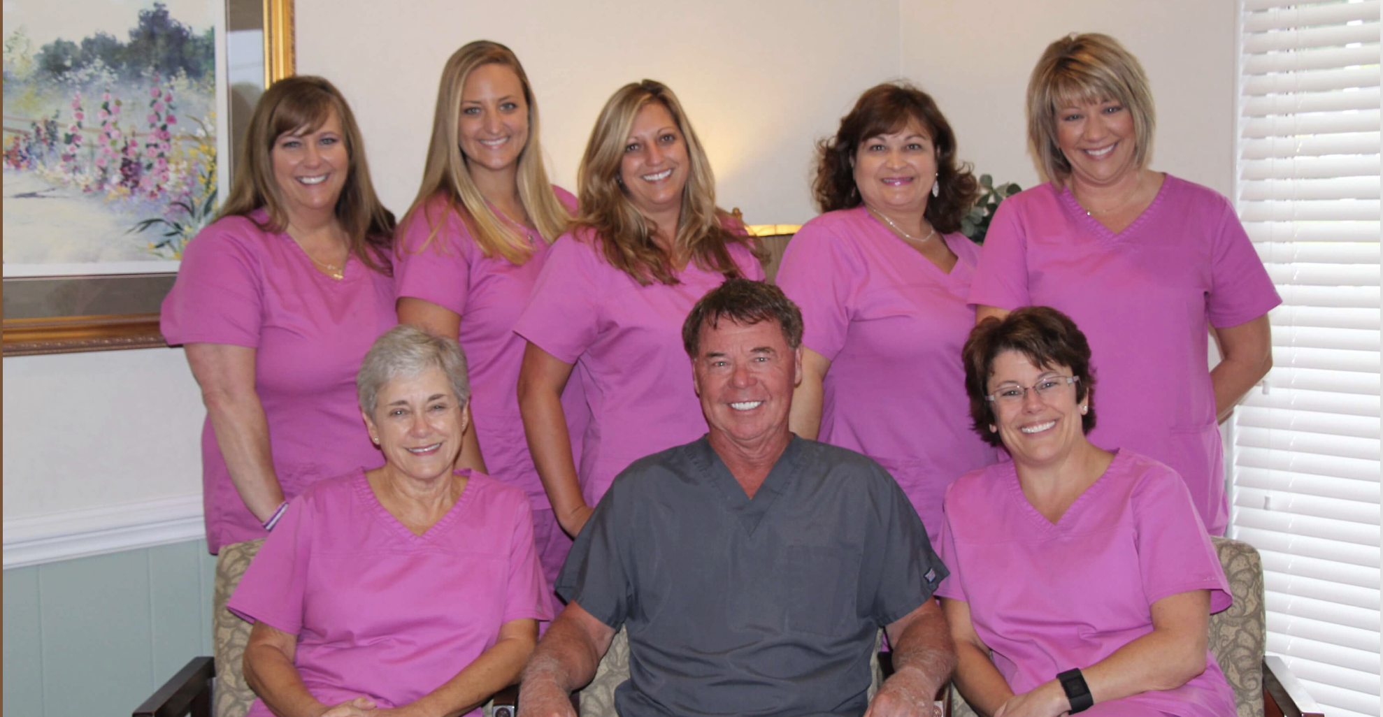 Dr. Clifford Compton with his long-serving dental team in Concord, North Carolina